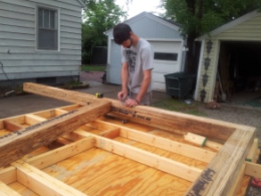 Kyle designing the front wall with engineered beams
