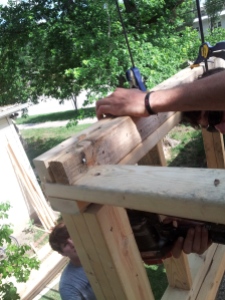 A header beam cut to fit around the framing.